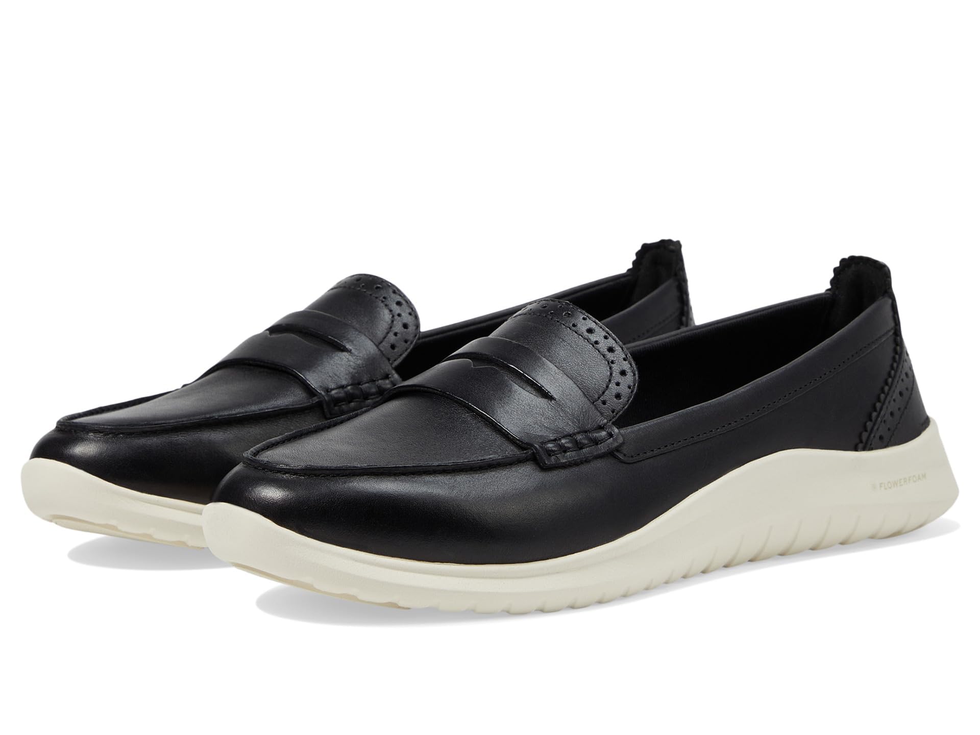 Cole Haan Mocasines de cuero Zerogrand Meritt para mujer, negro/marfil, 8-B US